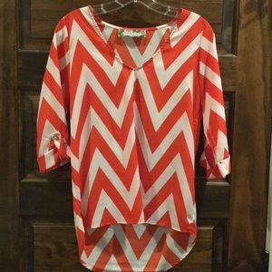 Orange and white chevron striped shirt